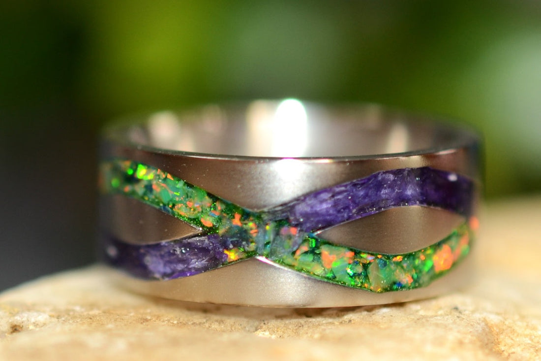 Handmade titanium floral ring with real dried flowers and crushed opal inlay.