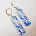 Double-sided Citadel earrings with blue and lavender Traditions Series artwork