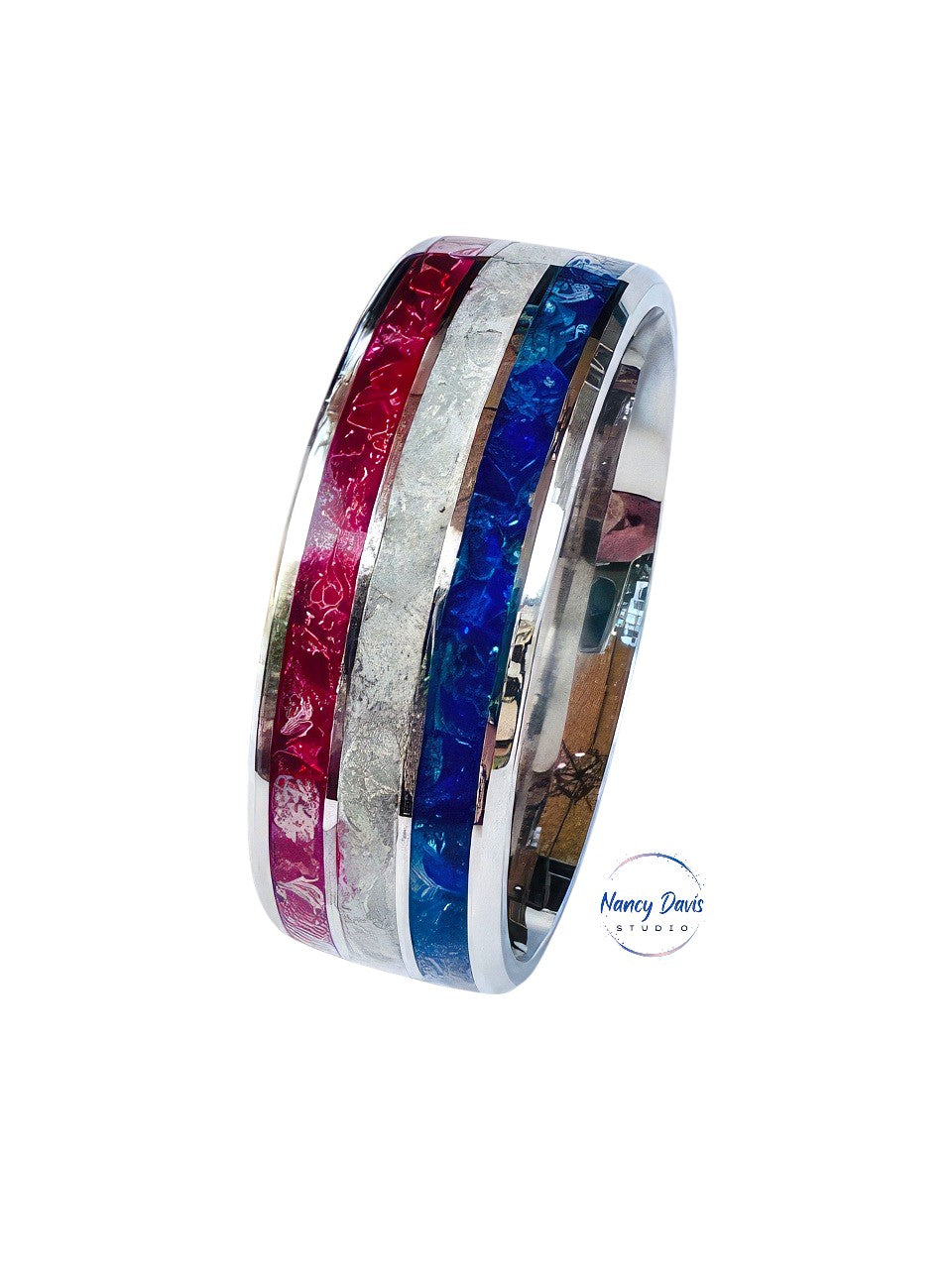 Express your patriotism with red, white and blue stones set into a 3-channel gleaming silver band ring