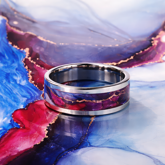 Passion Studio in Steel ring displayed on the original alcohol ink artwork from which each unique ring is created.