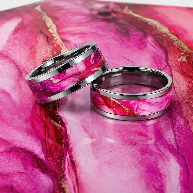 Sunrise Studio in Steel ring displayed beside the original alcohol ink painting from which the ring was handcrafted.