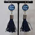 Block C and Star Citadel earrings with dark blue tassels and silver-tone caps