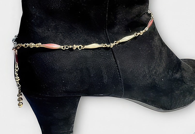 Elongated beaded gold tone chain for boot