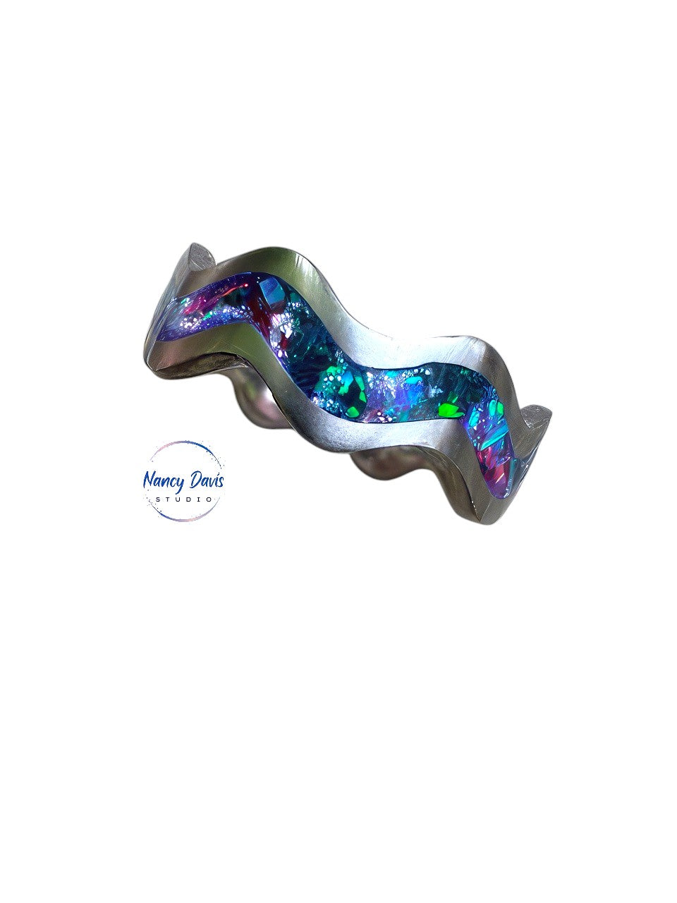 Iridescent blue, green and berry colored crusted opals set into a unique wavy design band ring