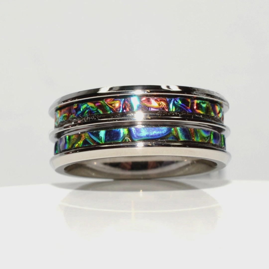Video of Lumina Kaleidoscope Ring showing handmade dichrolam inlay and five ring profile styles